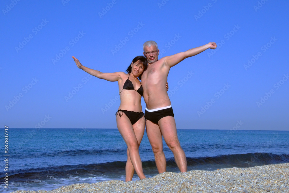 coco dana add mature couple beach photo